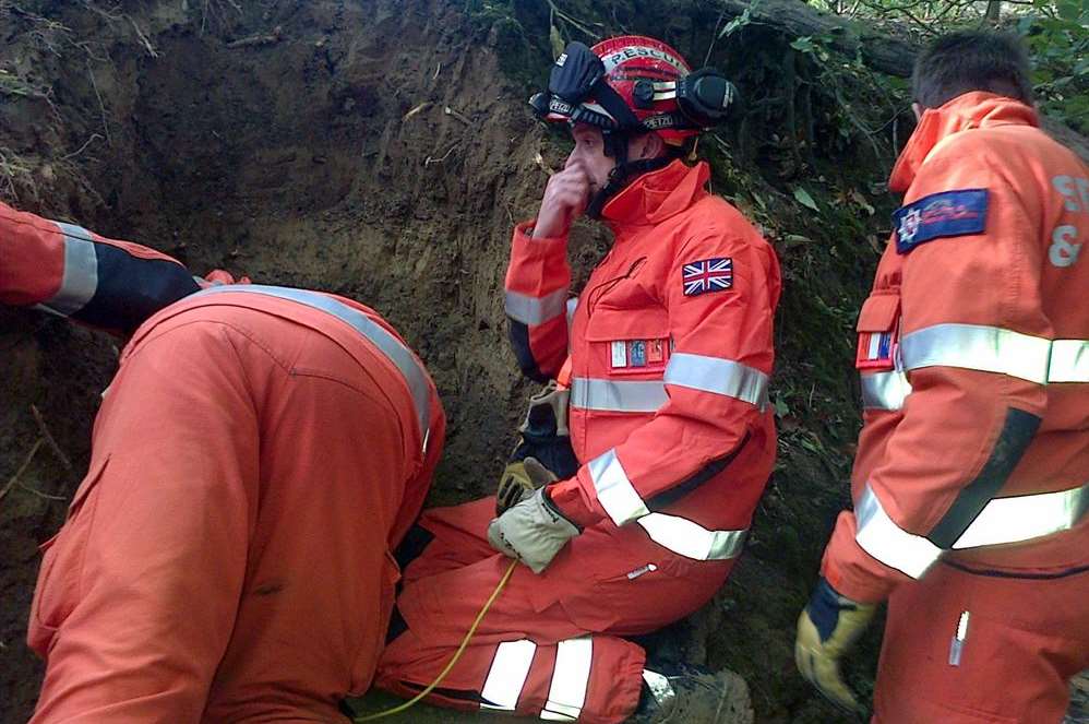 Firefighters rescue Brillo out of the badger hole