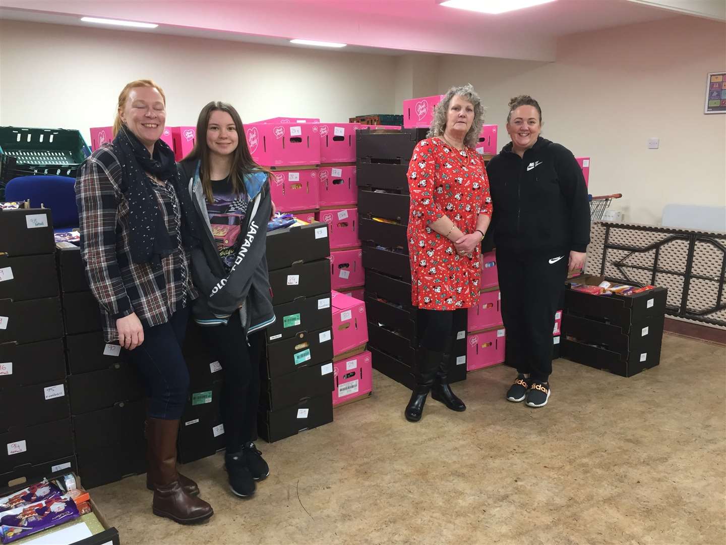 YMCA volunteers put together the food parcels