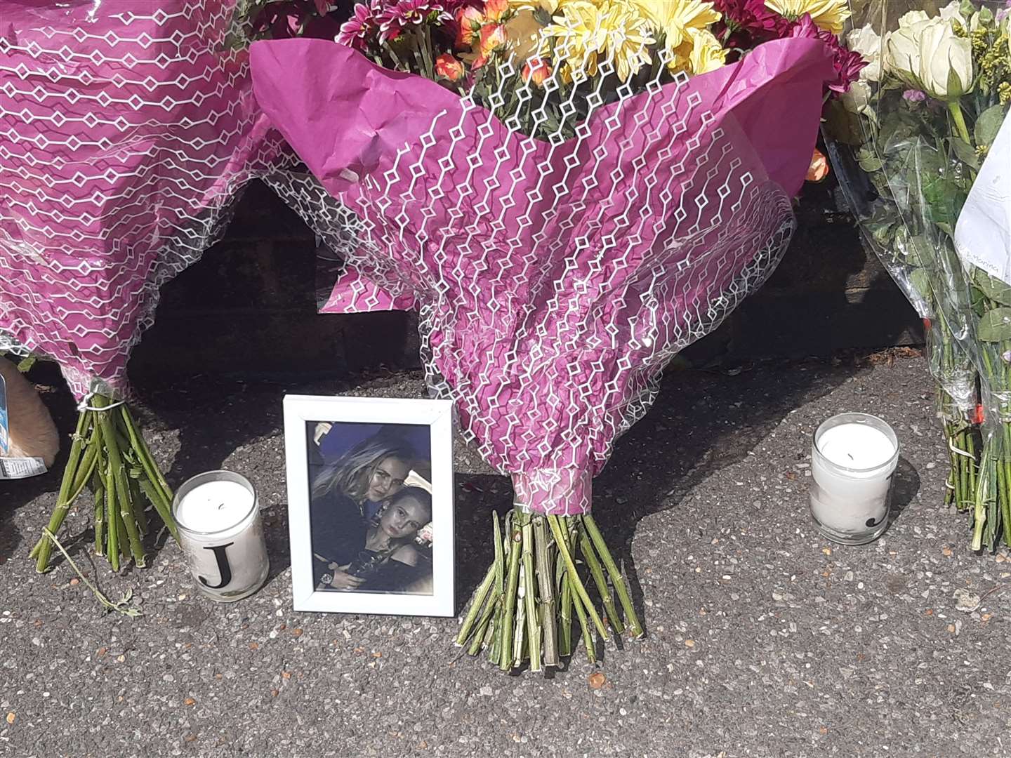 Floral tributes left outside Swanley station