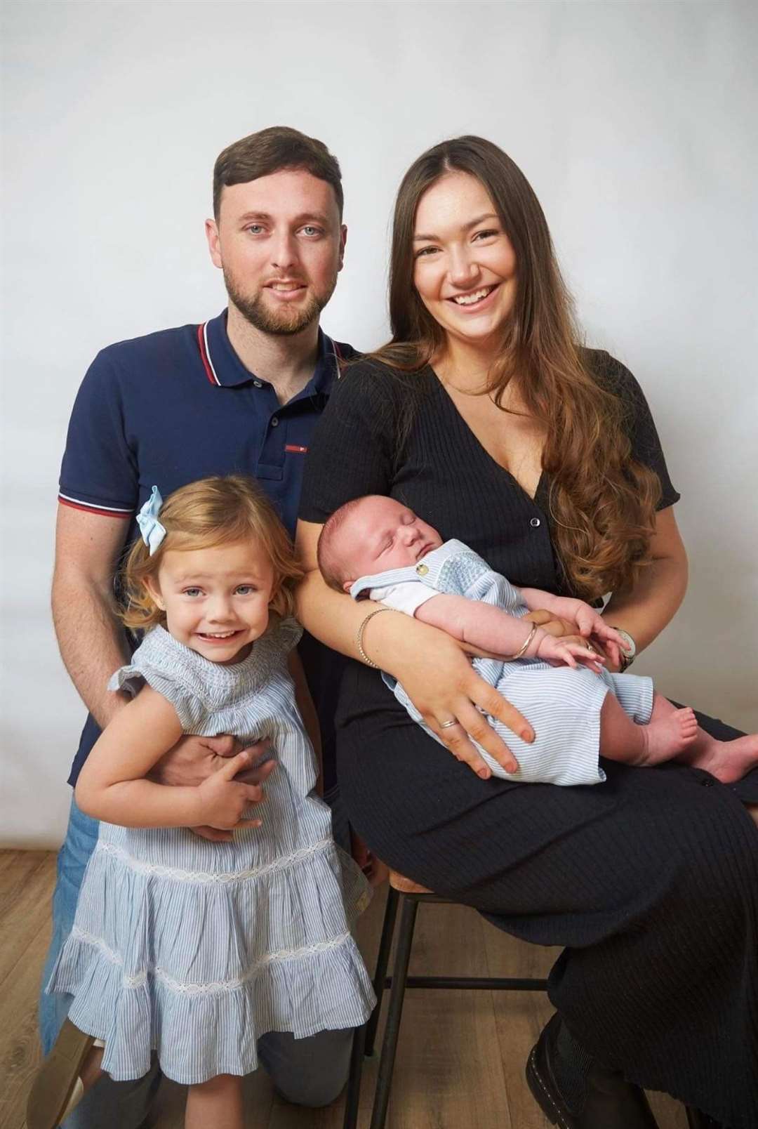Rosie Taylor holding her son, Albert, with her partner Robbie Stevenson, and their daughter Ivie