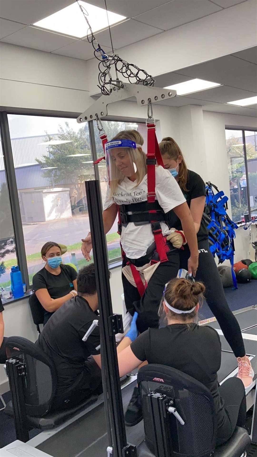 Hayley Bray, pictured during a different session, gets to grips with taking assisted steps on the treadmill