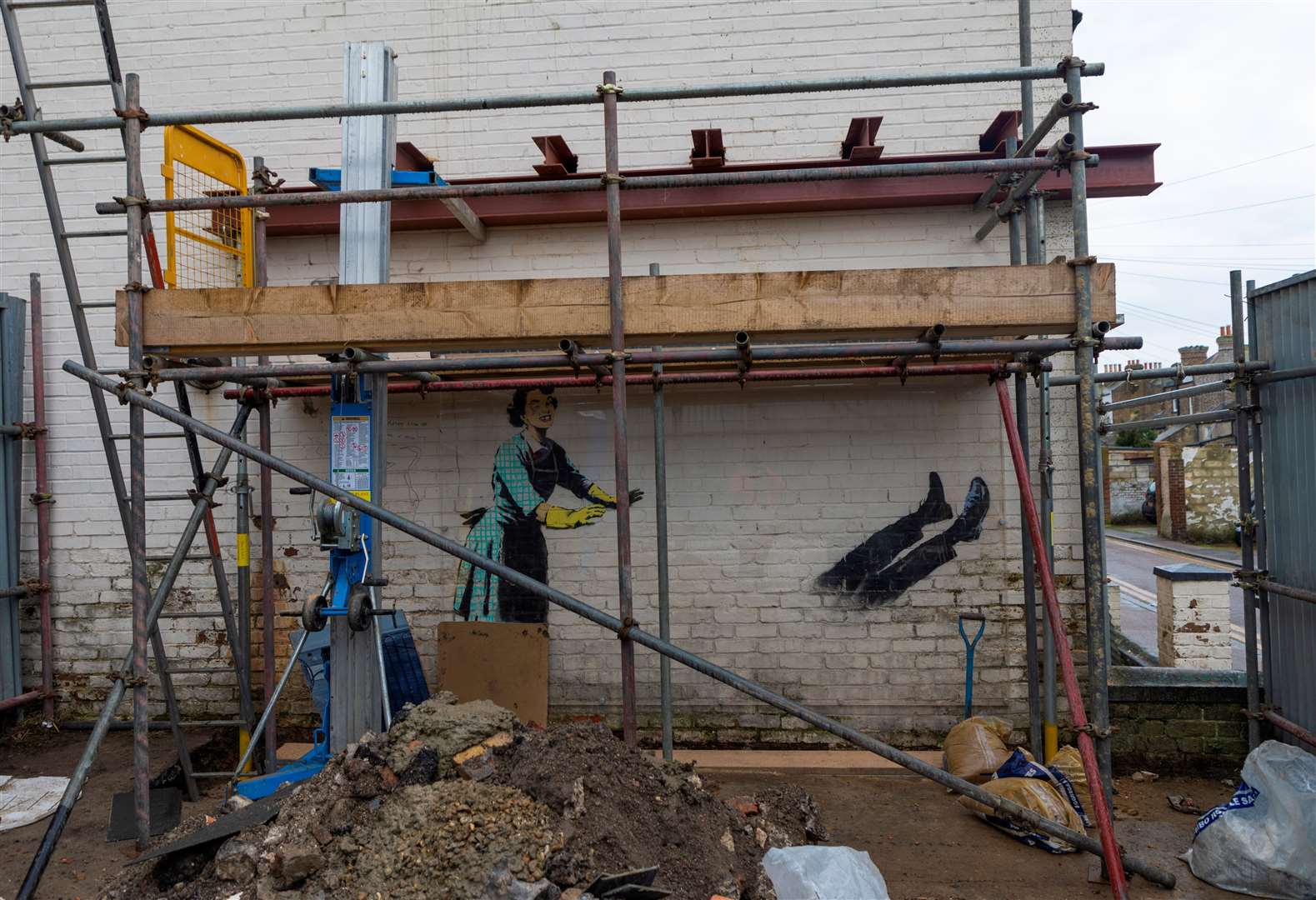 Scaffolding goes up as work begins on the wall. Picture: Ed Strickland/Red 8 Gallery