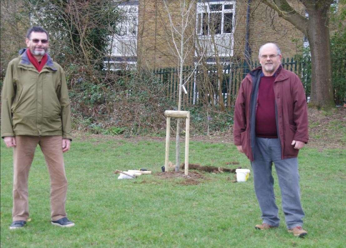 Cllr Paul Harper and Brian Skinner with one of the trees planted in memory of Barbara