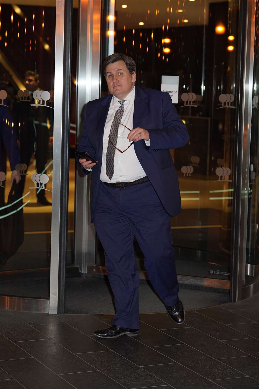 Minister for Crime and Policing Kit Malthouse leaves the Park Plaza Hotel (Yui Mok/PA)