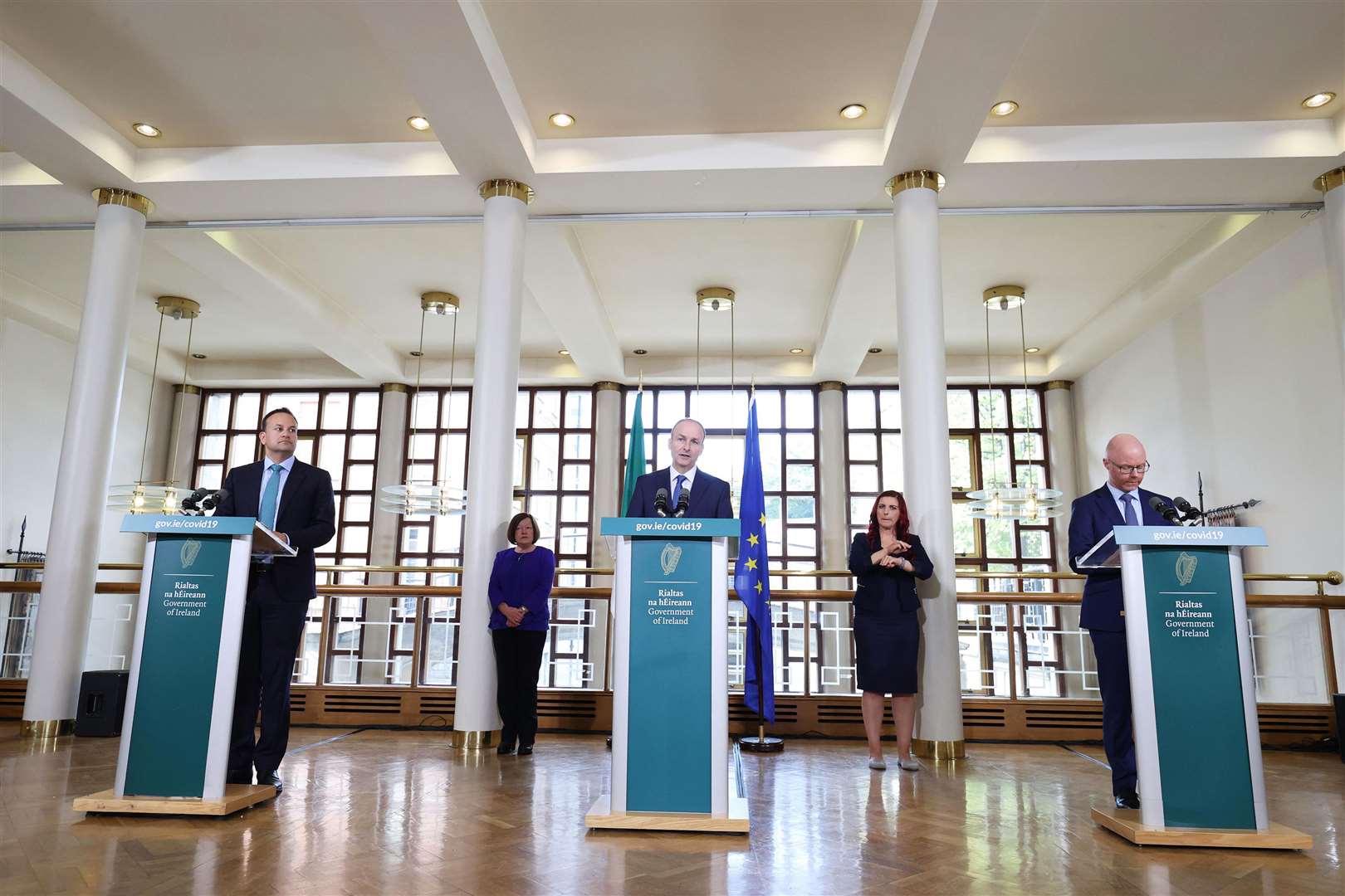 Tanaiste Leo Varadkar, Taoiseach Micheal Martin and Minister for Health, Stephen Donnelly launch the new Covid-19 plan (Julien Behal/PA)