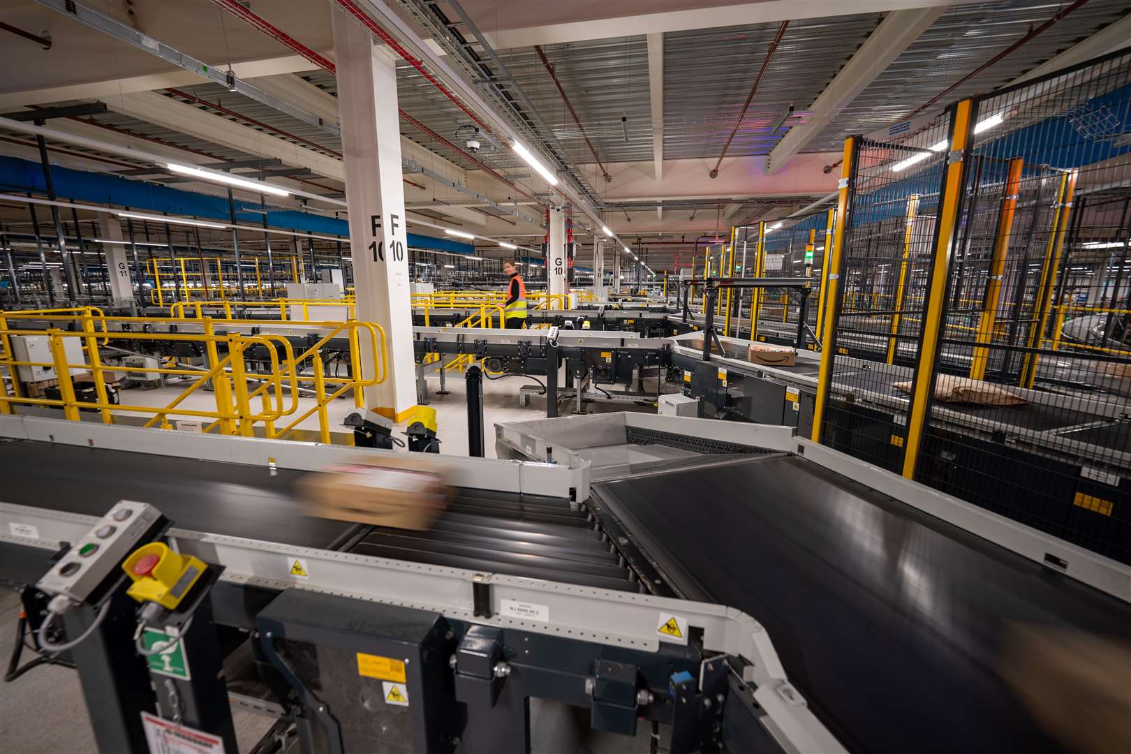 Parcels move around on conveyor belts (Birchall/PA)