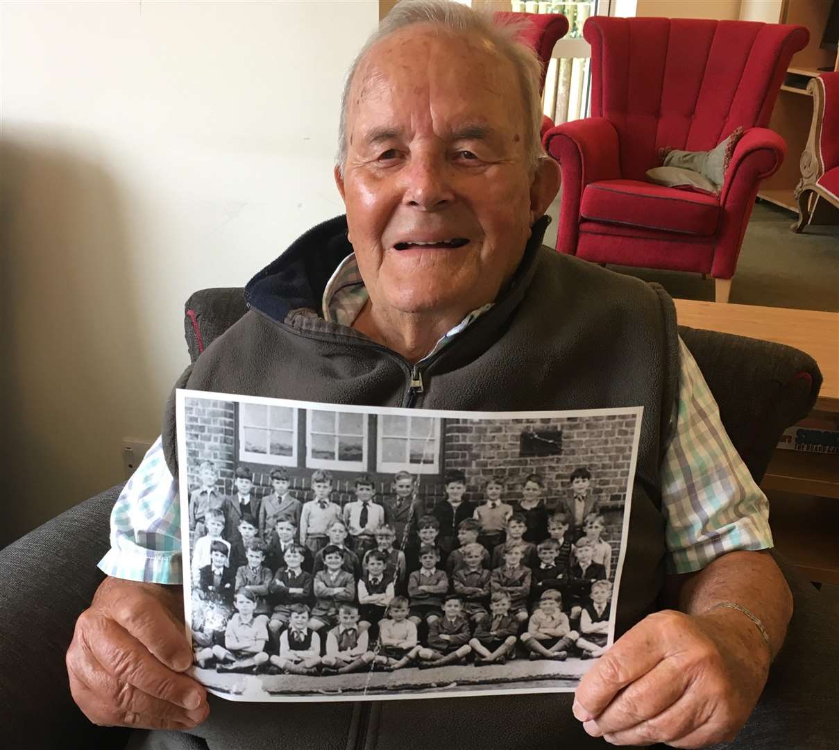 Retired teacher Douglas Champ says he immediately remembered the faces of every child in the photo