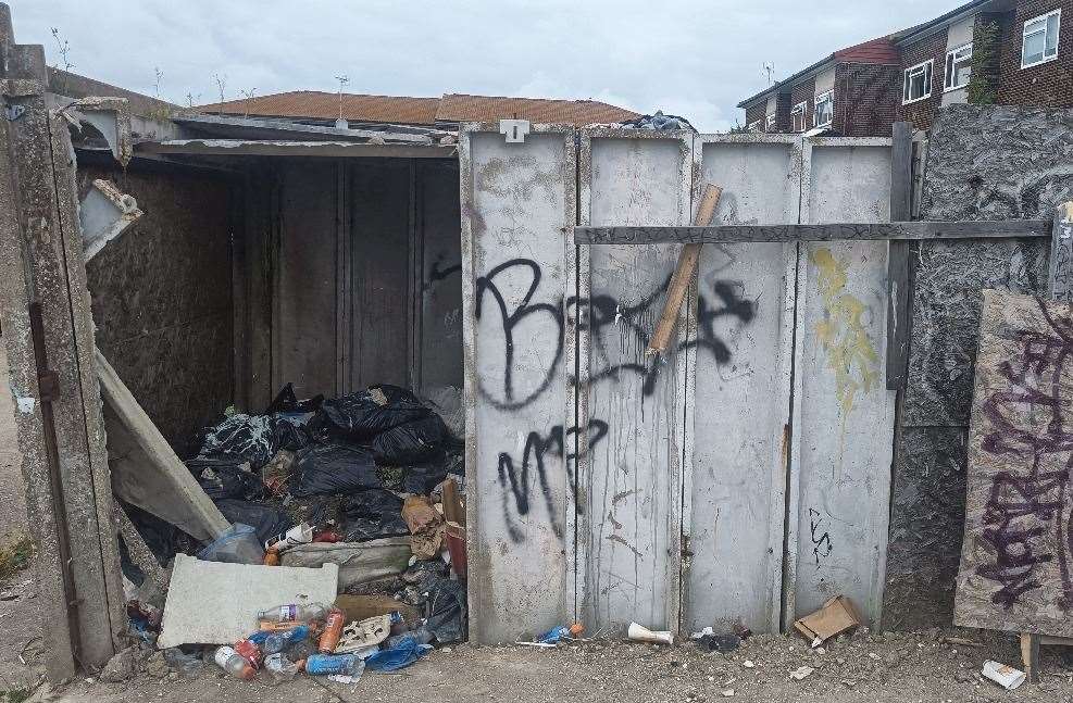 Rubbish had been dumped inside a number of the garages