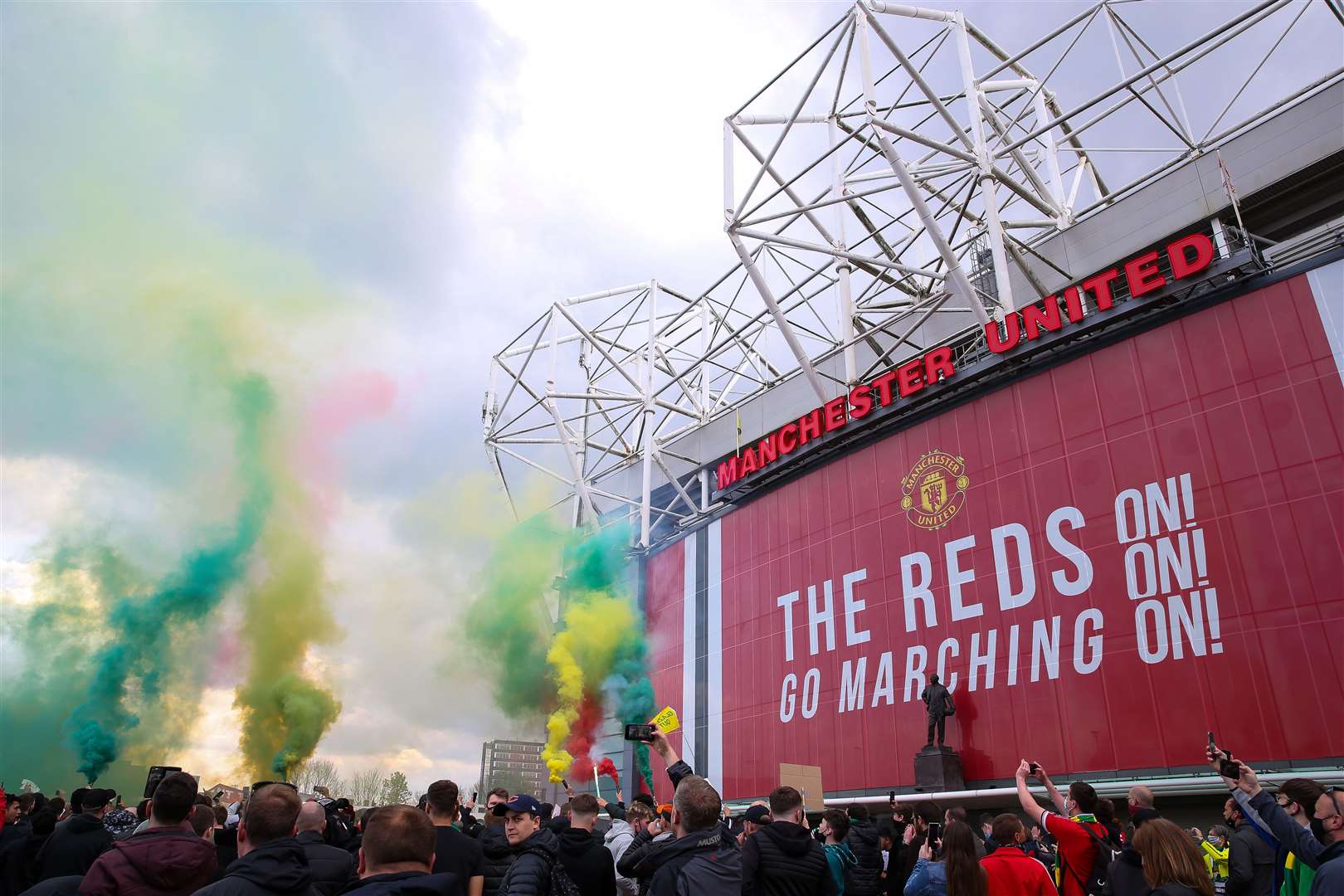 Fans let off flares as they protested against the Glazer family, the owners of Manchester United (PA)