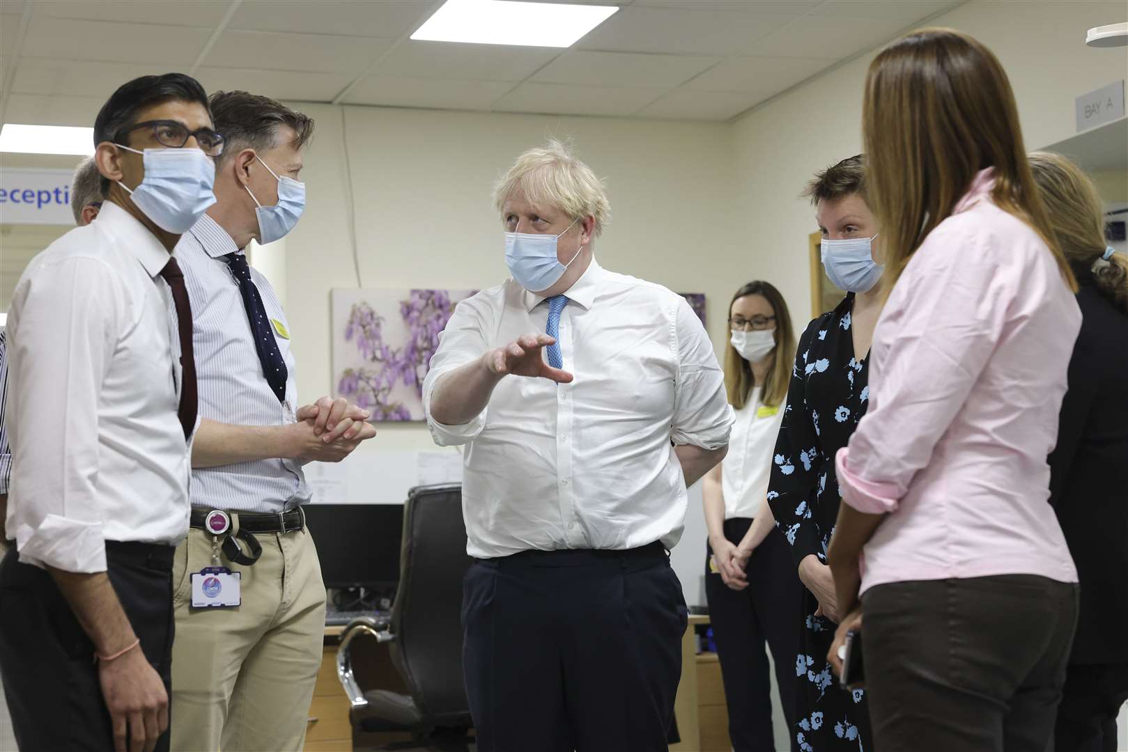 Prime Minister Boris Johnson and Chancellor Rishi Sunak talk to staff as they visit the Kent Oncology Centre at Maidstone Hospital. Picture: Andrew Parsons / No 10 Downing Street