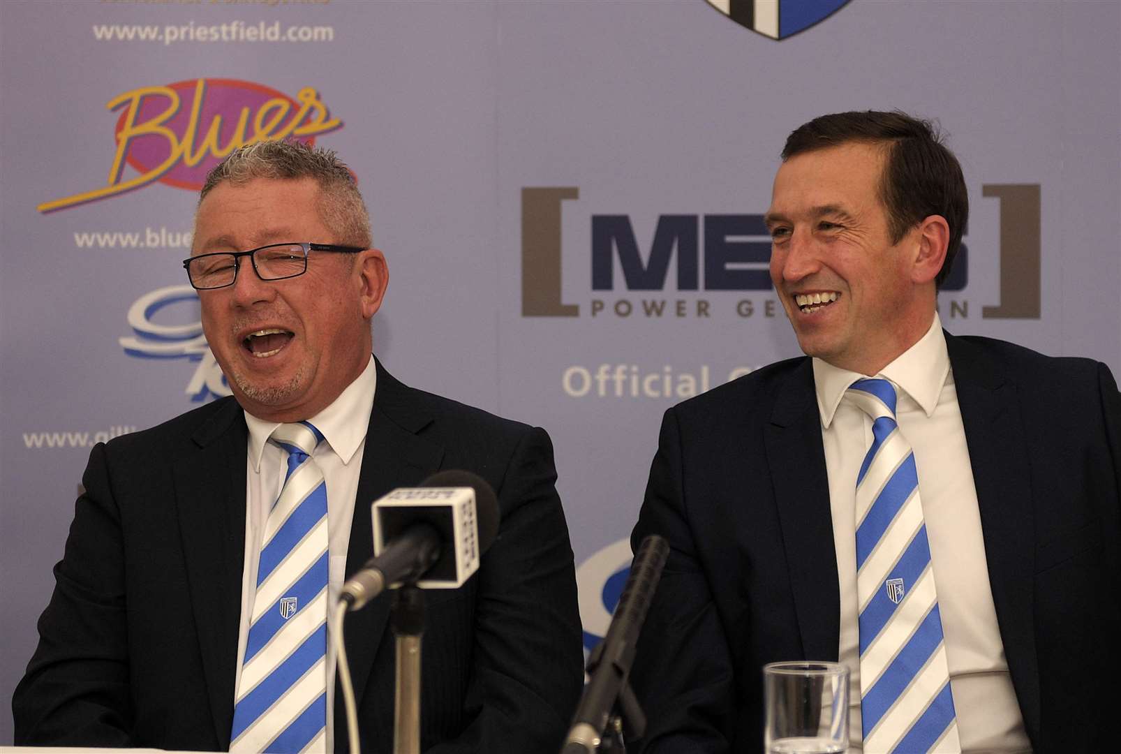 Chairman Paul Scally and then Gills manager Justin Edinburgh share a joke Picture: Barry Goodwin