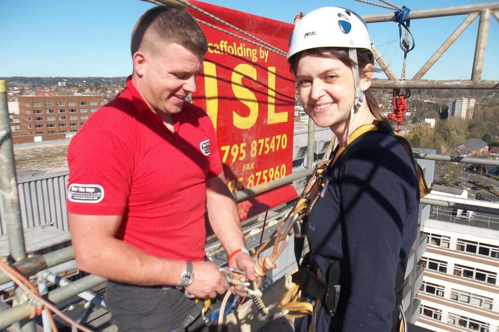 Ann-Marie Langley of Maidstone from event sponsor DSH being briefed by abseil instructor Joe Lovelock.