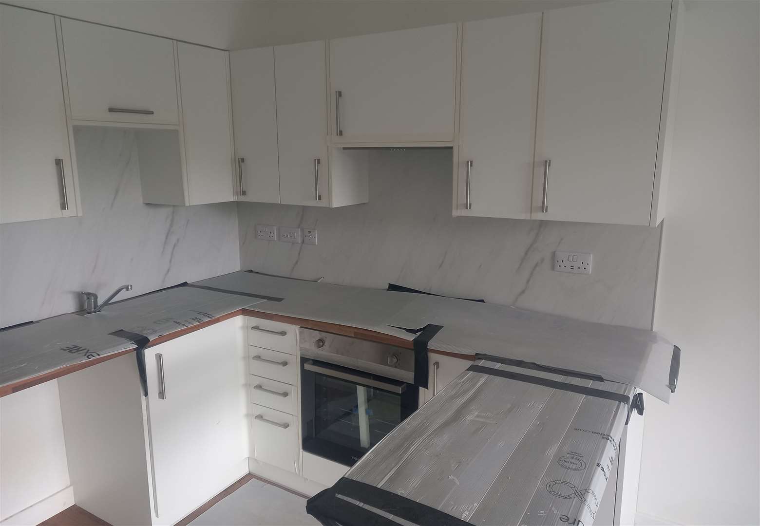 The new homeless pods are nearing completion, and each feature their own kitchen and bathroom. Picture: ABC