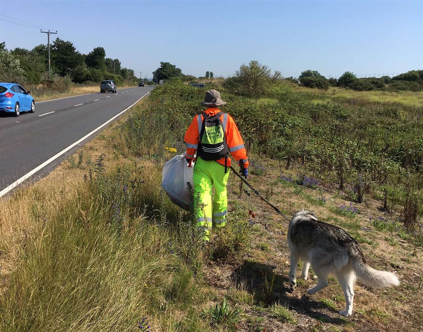 Wayne and Koda help clean up the district. Picture: Eric Brown (15793846)