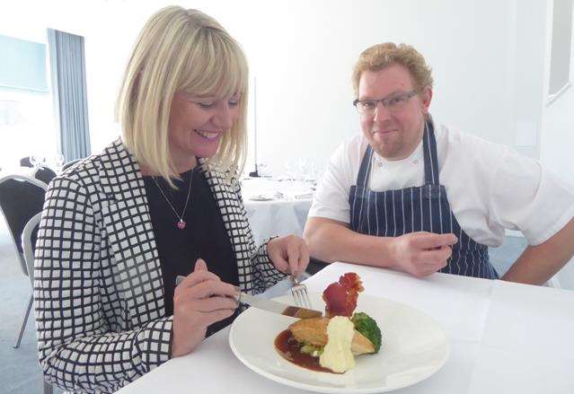 Karen Brinkman of the KM Charity Team tries some food prepared by Yarrow Hotel head chef Ben Williams (5070603)