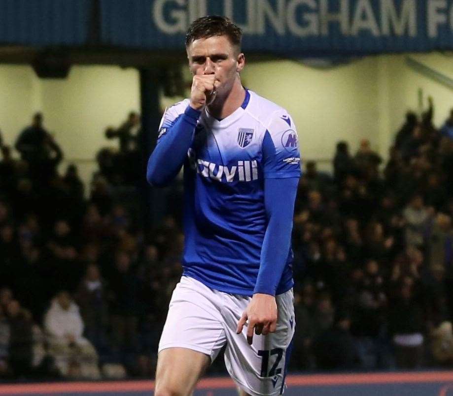 Oli Hawkins celebrates his goal in Gillingham’s 2-2 home draw against Swindon on Tuesday. Picture: Beau Goodwin