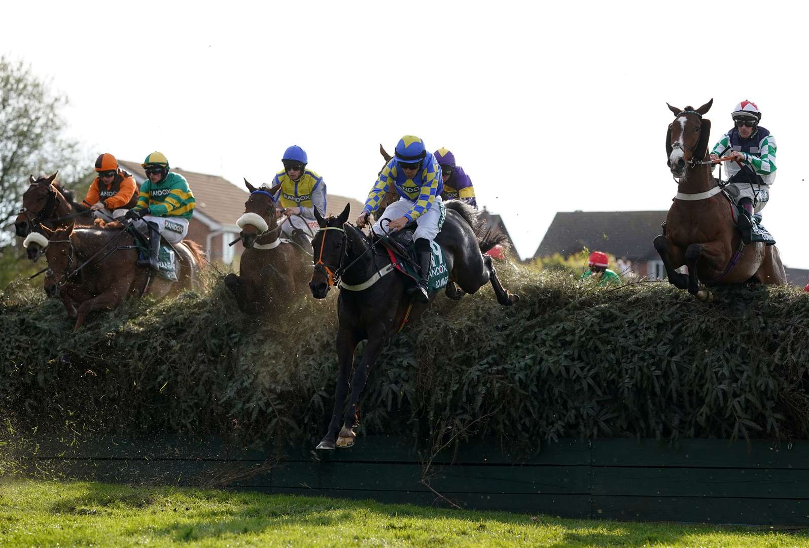 Runners tackle Beechers Brook during day three of the 2023 Randox Grand National Festival (Tim Goode/PA)