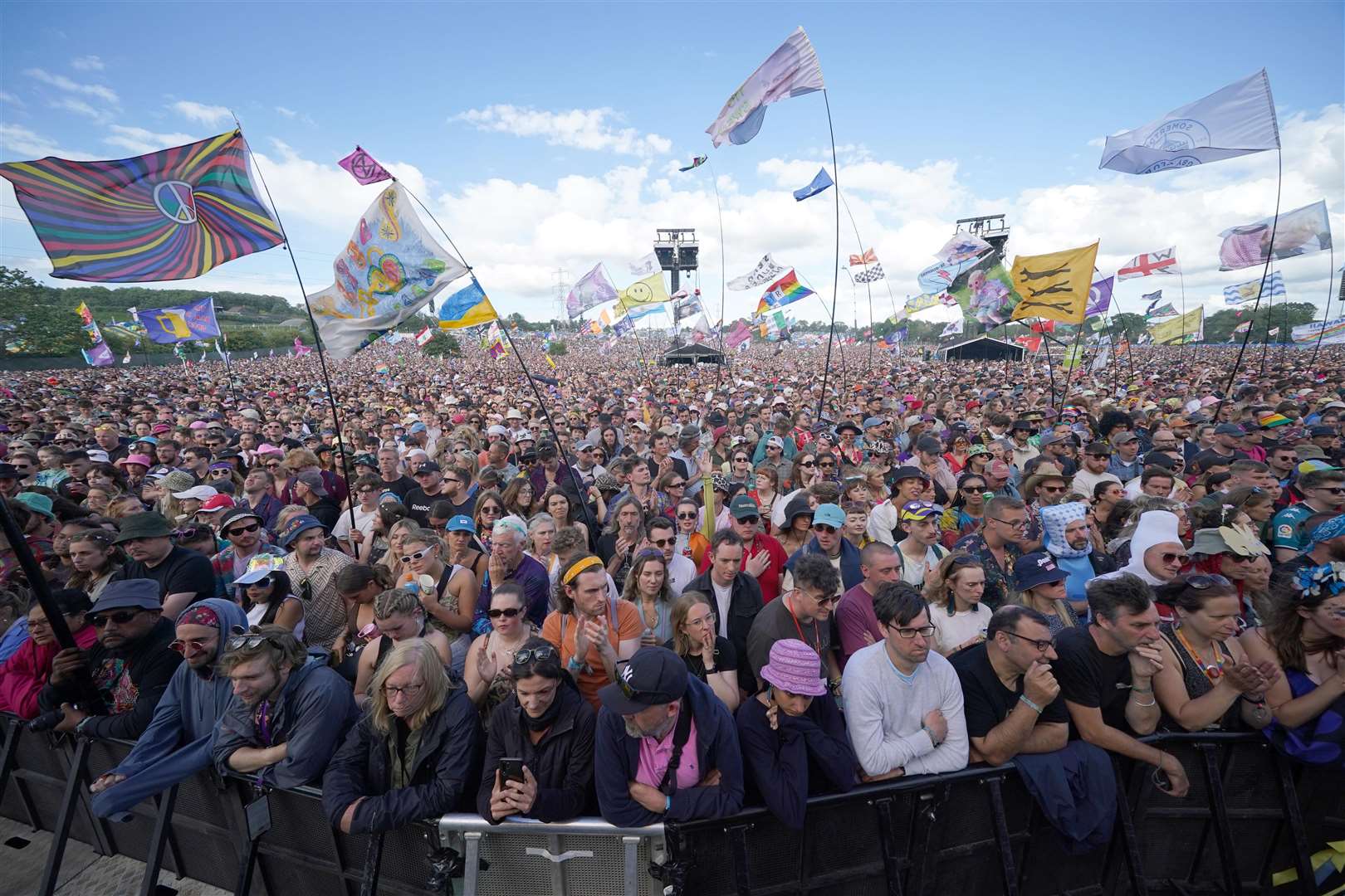 Festivalgoers listen to Greta Thunberg (Yui Mok/PA)