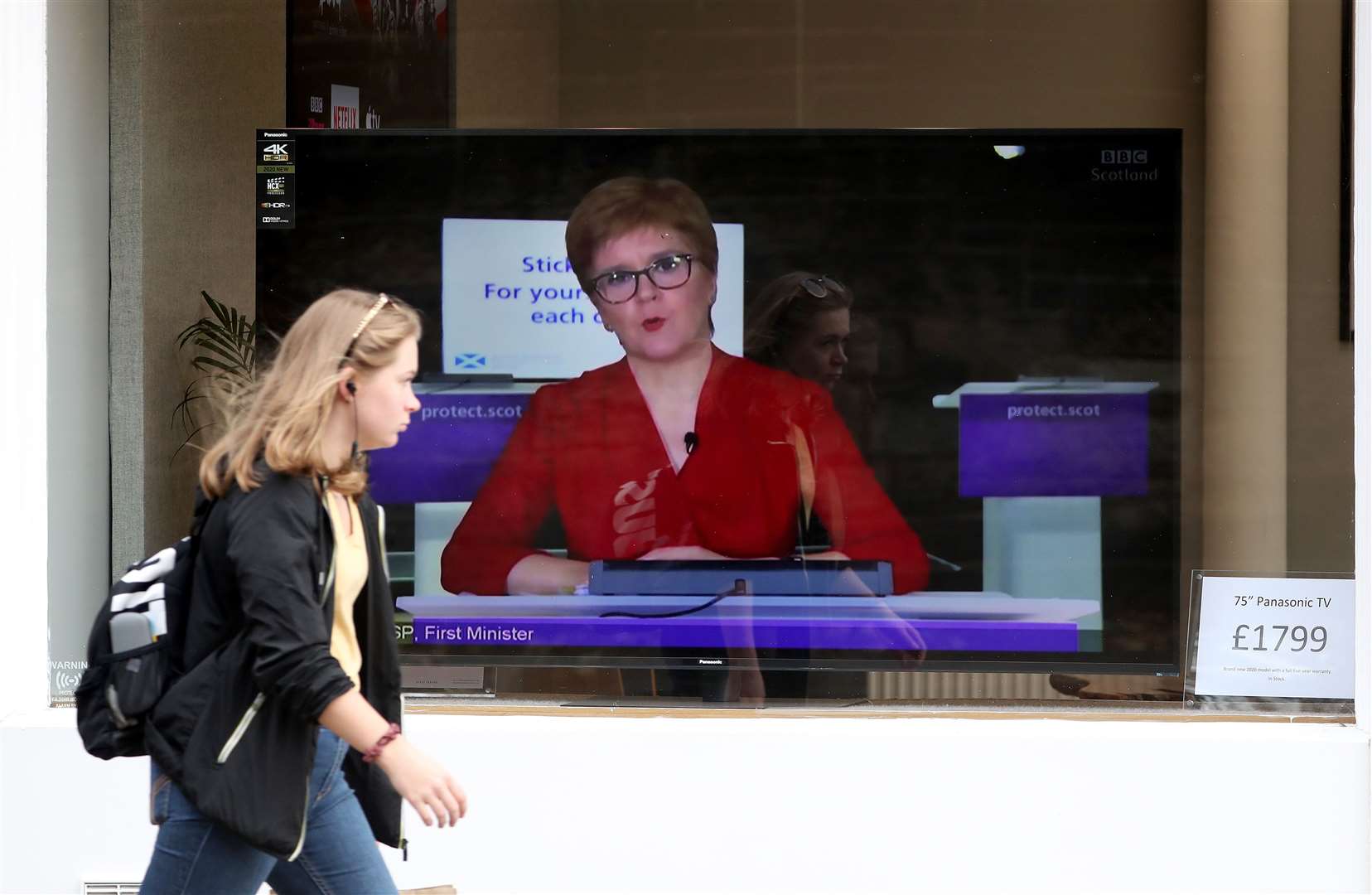 Nicola Sturgeon said the falling positivity rate is ‘undoubtedly a small ray of sunshine’ (Andrew Milligan/PA)