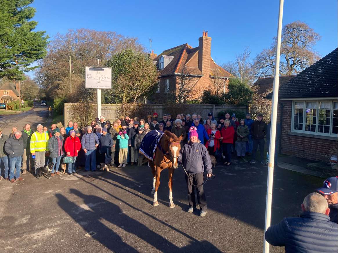 The racehorse was given a hero’s welcome the day after his victory when he met syndicate members (Rupert Adams/PA)