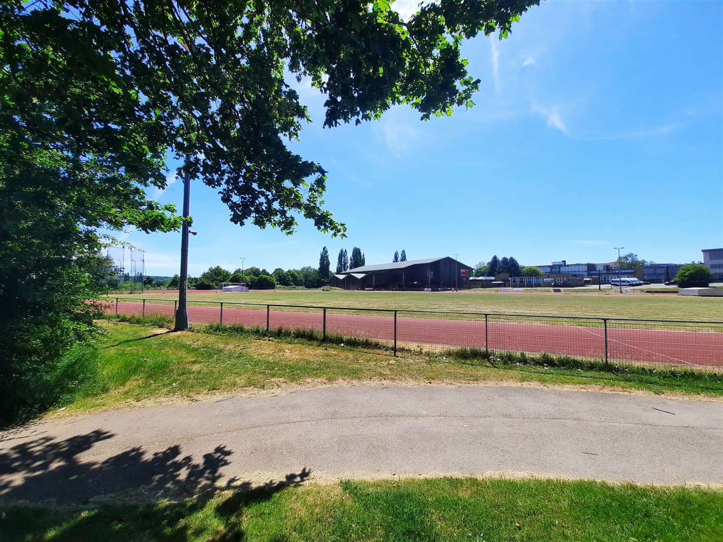 A man died after being found unconscious near the running track at Canterbury Academy