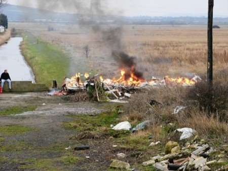 A caravan being burnt off Faversham Road, Seasalter. The fire caused huge clouds of smoke over the area.