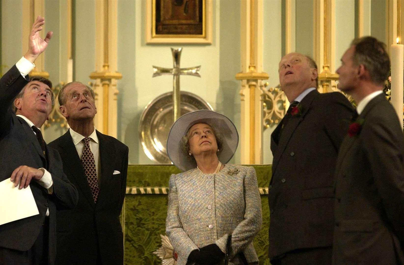 The Queen and the Duke of Edinburgh visiting the Chapel of the Savoy, which is part of the Duchy of Lancaster estate, in London in 2003 (Chris Young/PA)