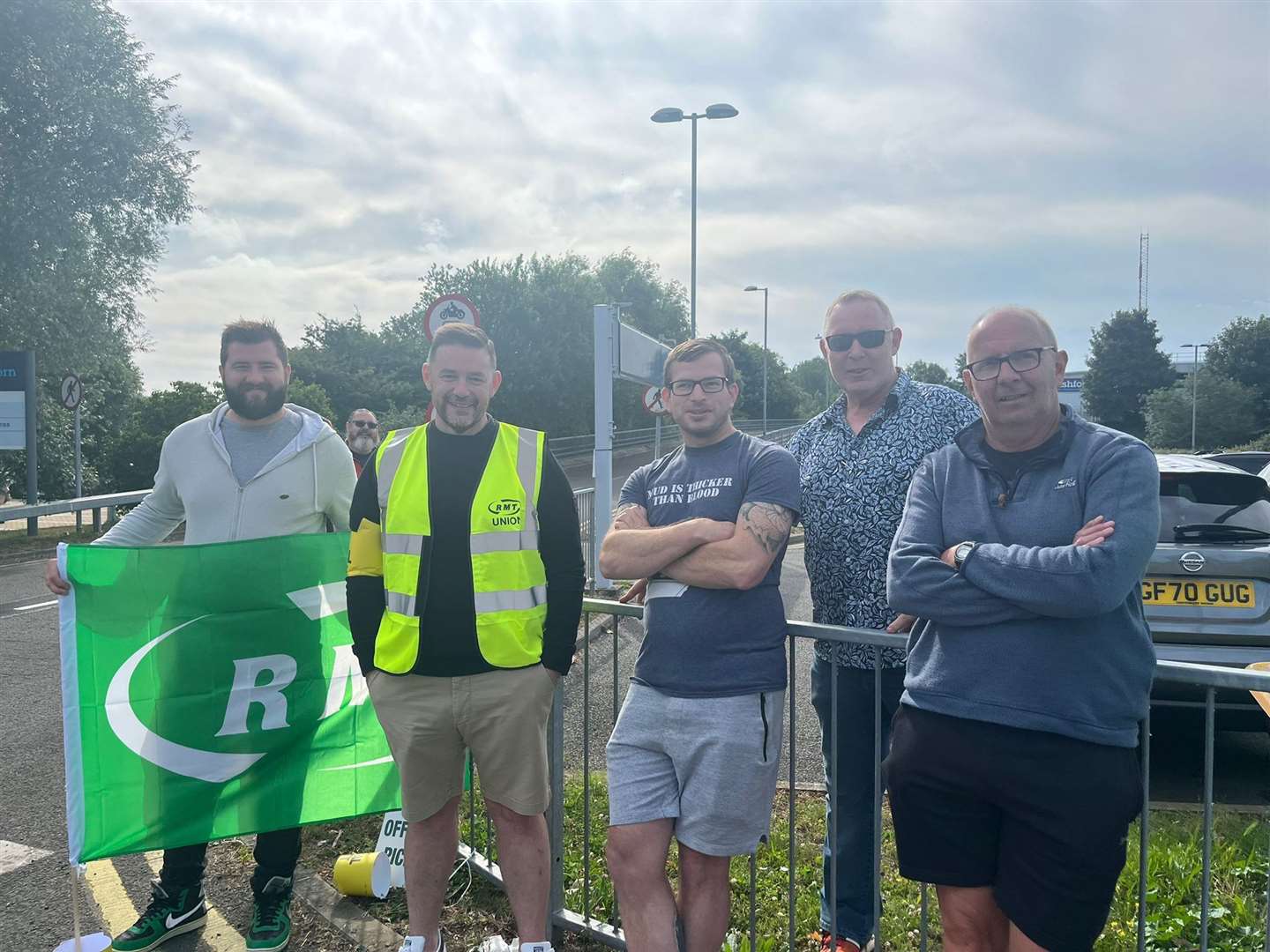 Members of the RMT union outside Ashford International Nick (in high-vis) and Martin (to his left)