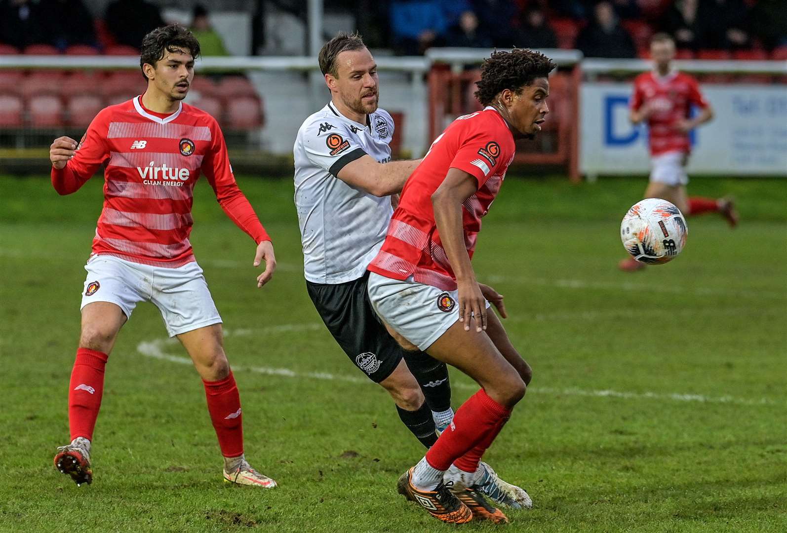 Dover's Jordan Higgs and Sido Jombati go for the ball. Picture: Stuart Brock