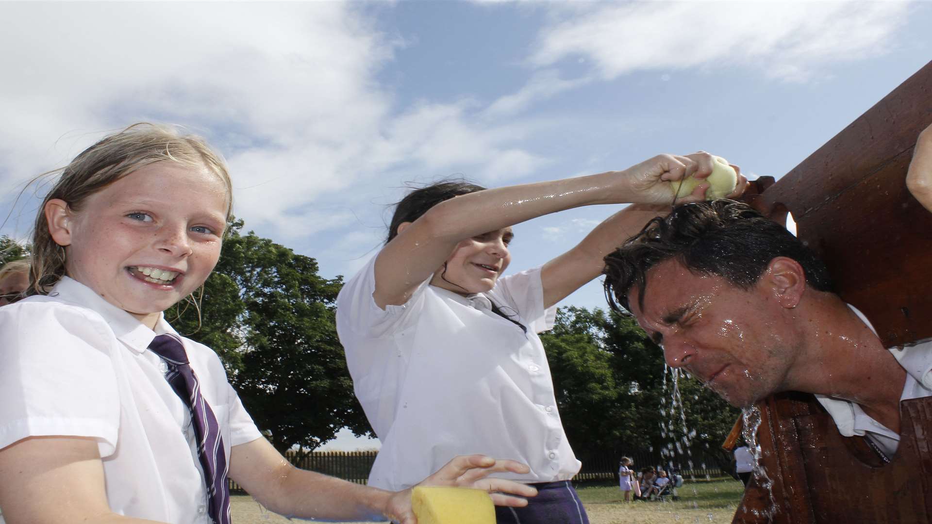 Summer school fair Jade and Tammy and Mr Newing