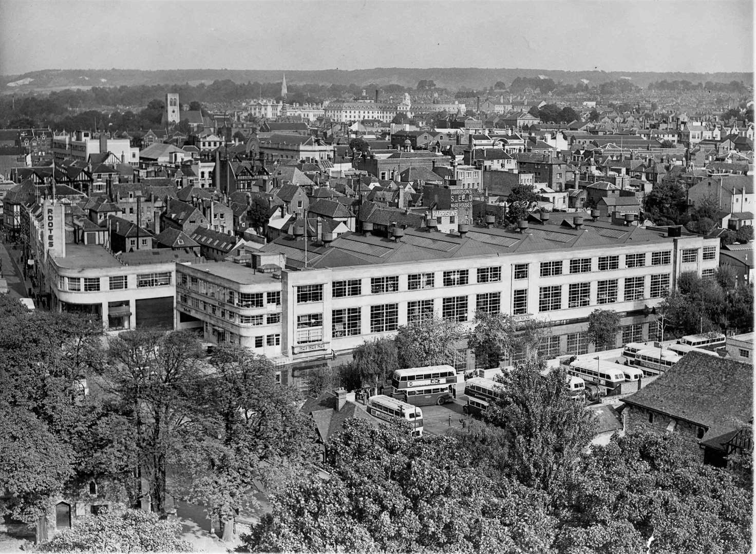 The heart of Maidstone in the 1950s, dominated by Rootes factory, with County Hall prominent in the background and the Maidstone & District bus depot in the foreground