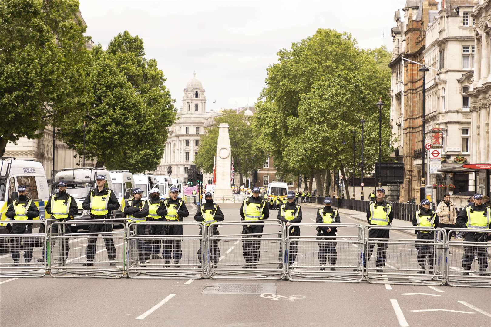 A police barrier in London between two protests by Stand up to Racism and a protest march organised by Tommy Robinson in June (David Parry/PA)