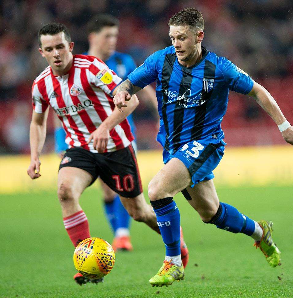 Mark Byrne on the ball for Gillingham Picture: Ady Kerry (7300369)