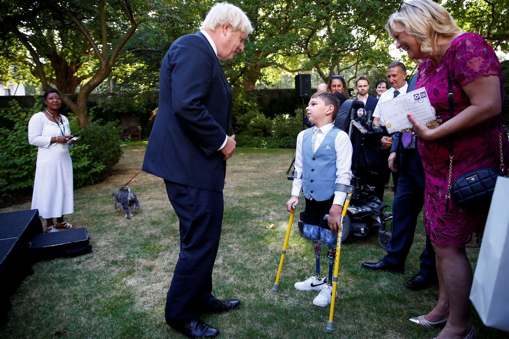 Prime Minister Boris Johnson talking to Tony Hudgell (Peter Nicholls/PA)