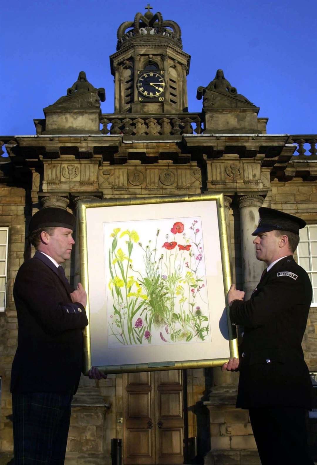 A painting by Dame Elizabeth Blackadder is carried in to the Palace of Holyroodhouse after she was appointed Her Majesty’s Painter and Limner (Ben Curtis/PA)