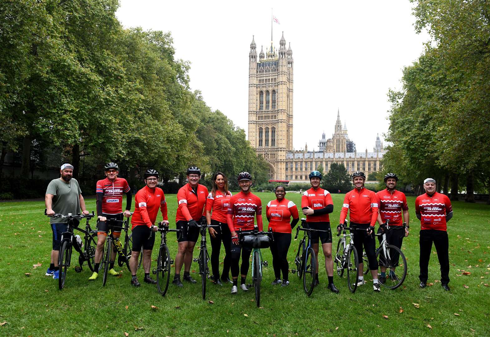 Gordon Miller (middle) with cyclists from his community interest company (James Aubry/PA)