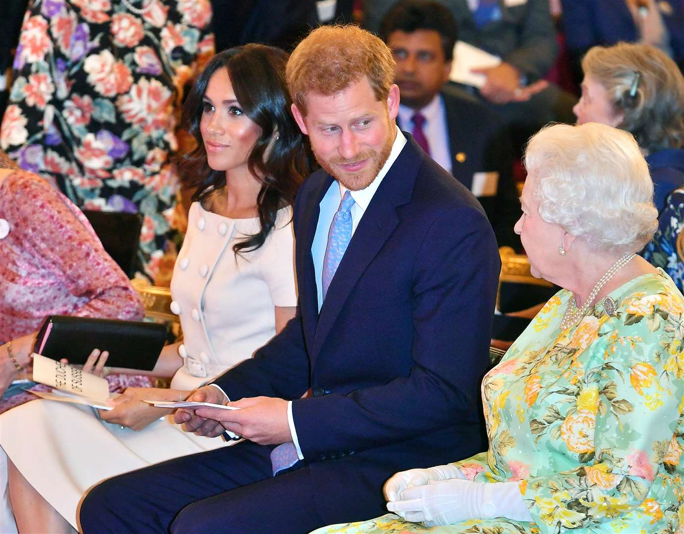 The Sussexes with Harry’s grandmother the Queen in 2018 (John Stillwell/PA)