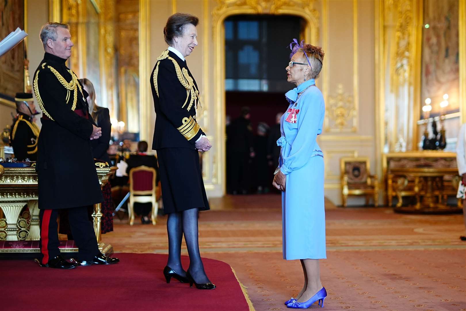 Anita Neil speaks to the Princess Royal at her investiture (Aaron Chown/PA)