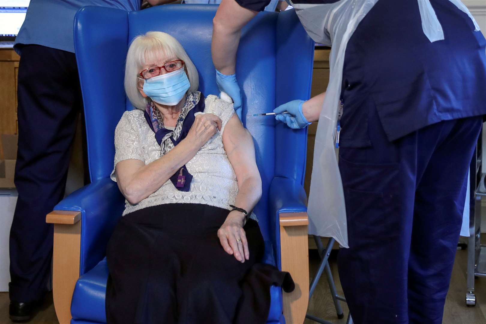 Resident Margaret Keating, 88, receiving a coronavirus vaccine at the Abercorn House Care Home in Hamilton (Russell Cheyne/PA)