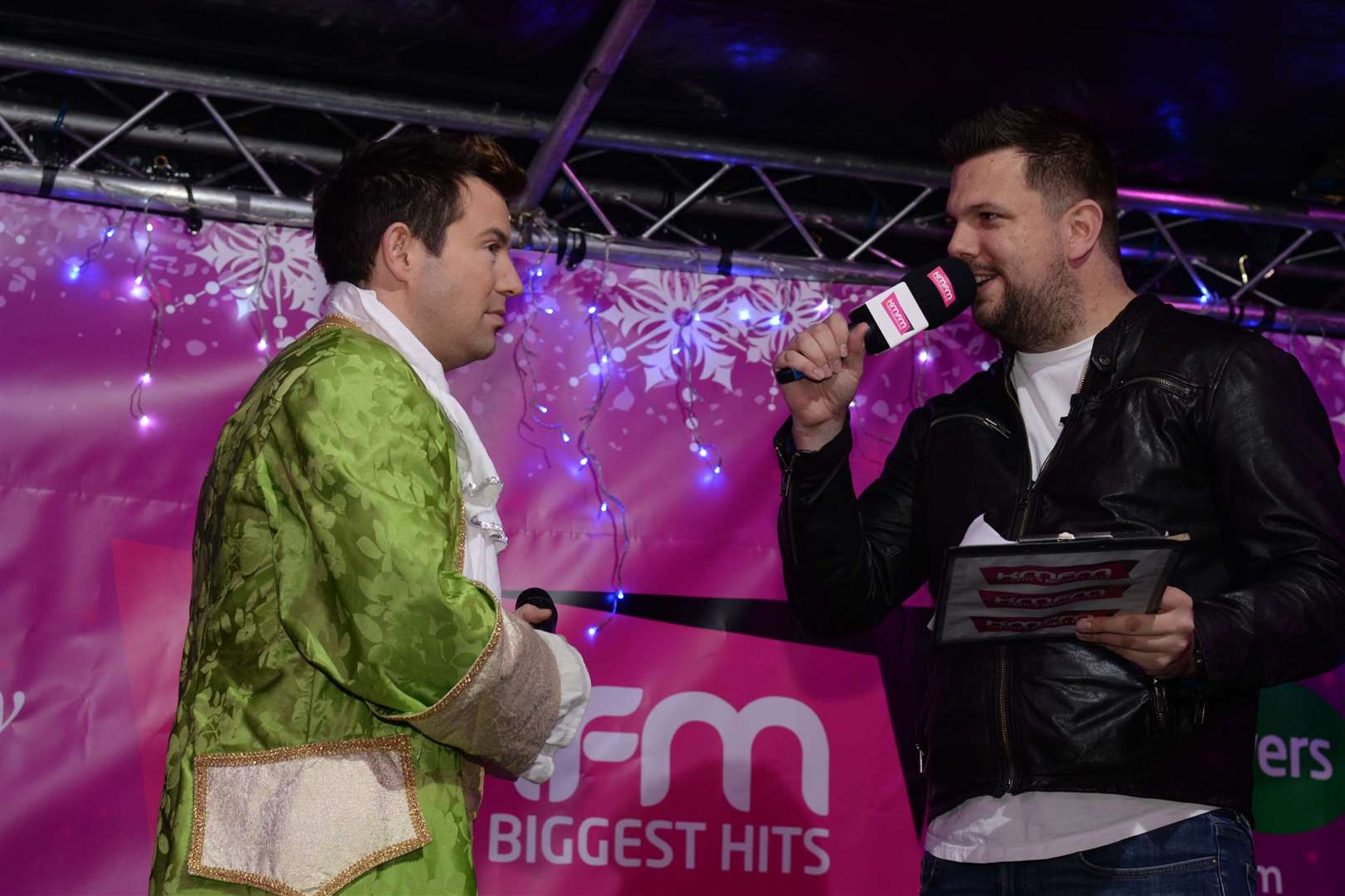 Panto star Derek Moran and KMFM's Rob Wills at the previous Rochester Christmas Lights switch on. Picture: Chris Davey