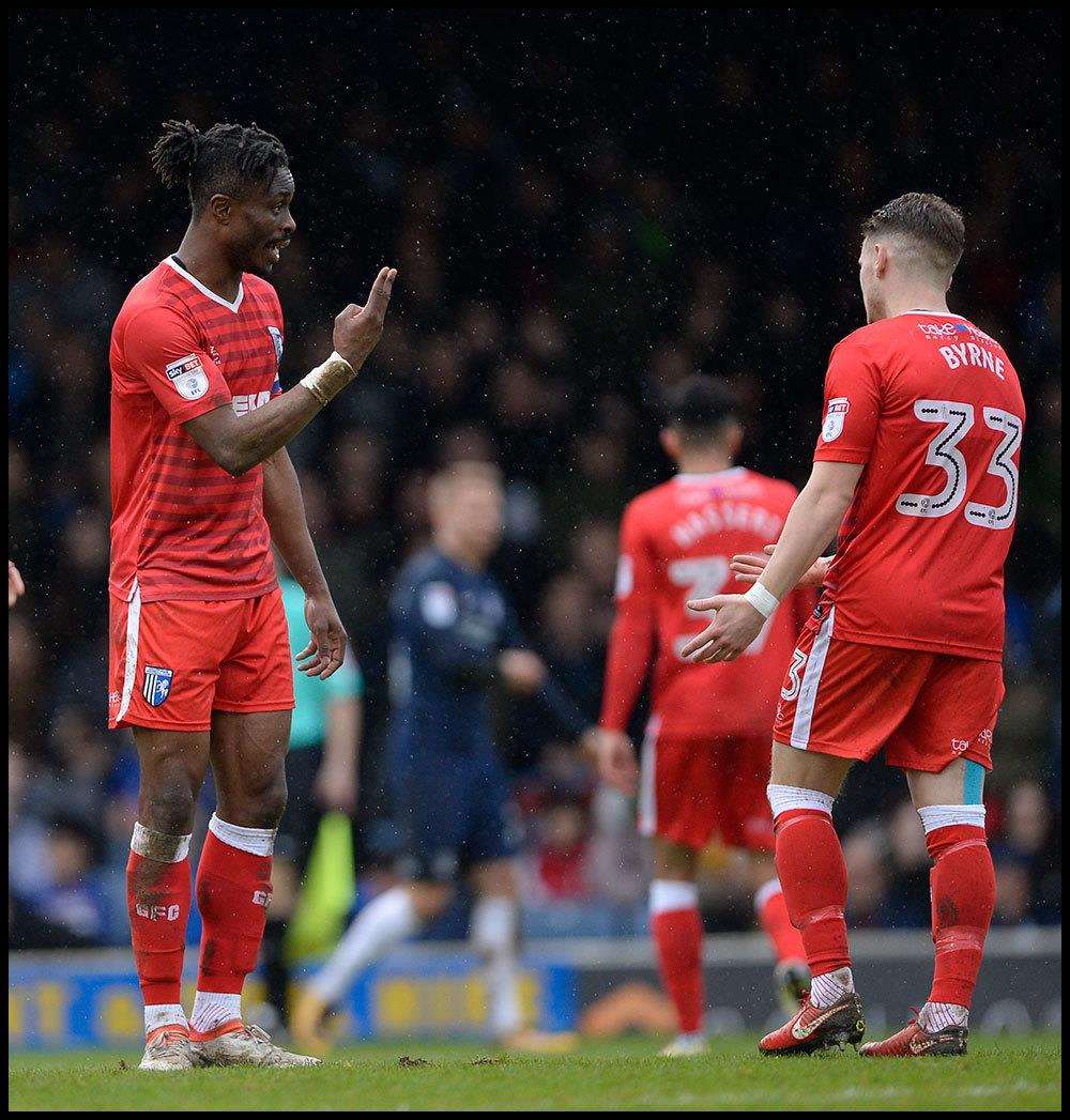 Gillingham's Gabriel Zakuani and Mark Byrne at Southend Picture: Ady Kerry