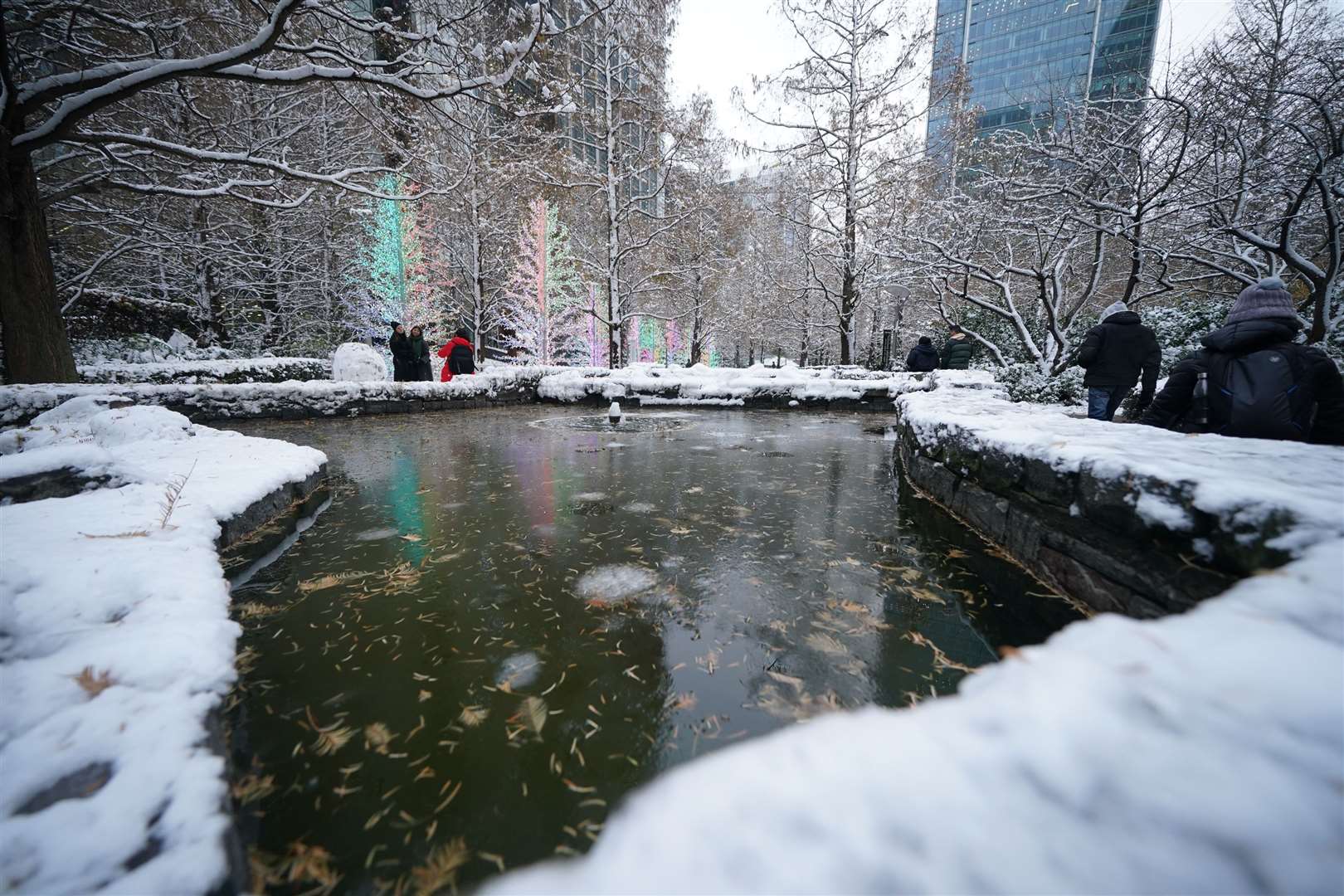 Snow and ice greeted workers in London’s Canary Wharf on Monday morning (Yui Mok/PA)