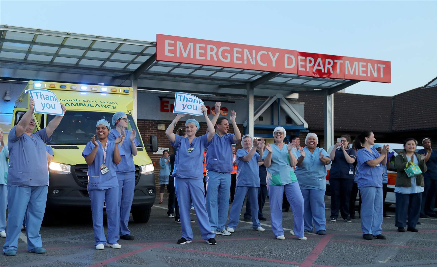 Doctors, nurses and NHS staff outside the William Harvey Hospital, in Ashford, Kent (Gareth Fuller/PA)