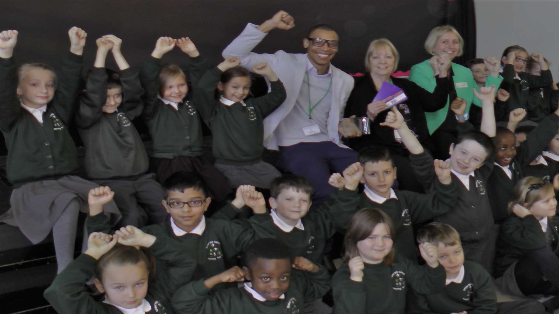 Eric Hodges of Orbit South housing association, Cllr Val Clark, chair of transport users sub committee in Bexley, and Melanie Neale, head teacher of Gravel Hill Primary School with pupils.