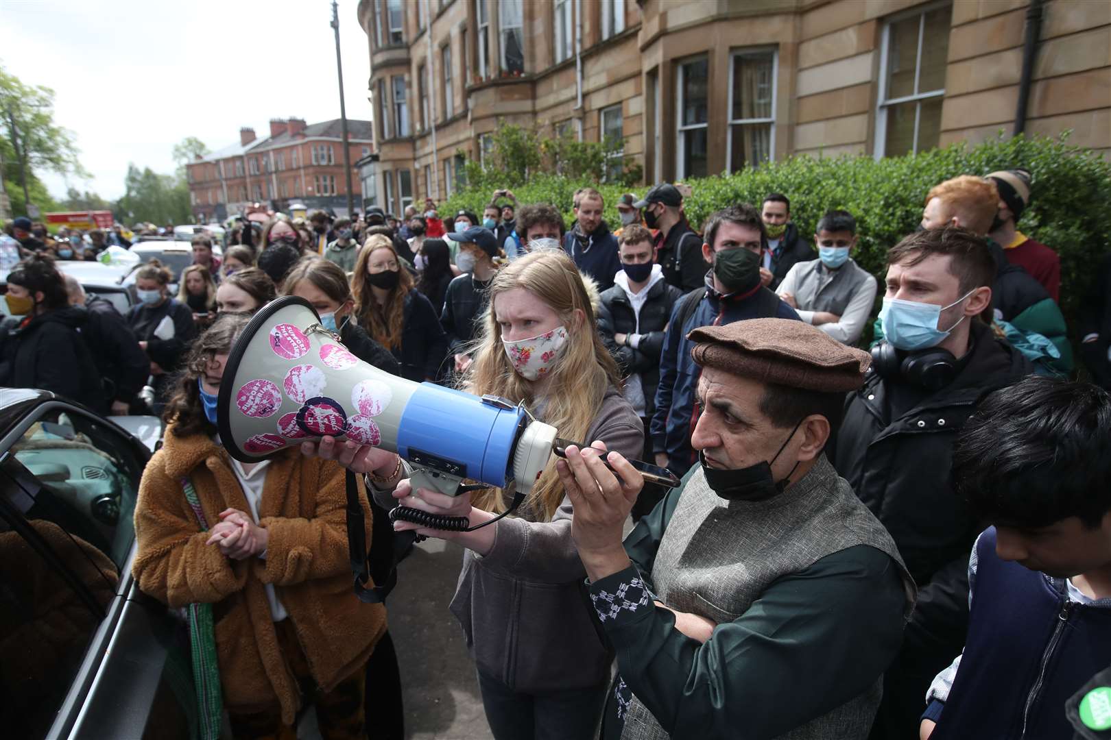 Mohammad Asif (right) joined a protest in Glasgow in May which blocked a border force van from detaining two Indian nationals (Andrew Milligan/PA)