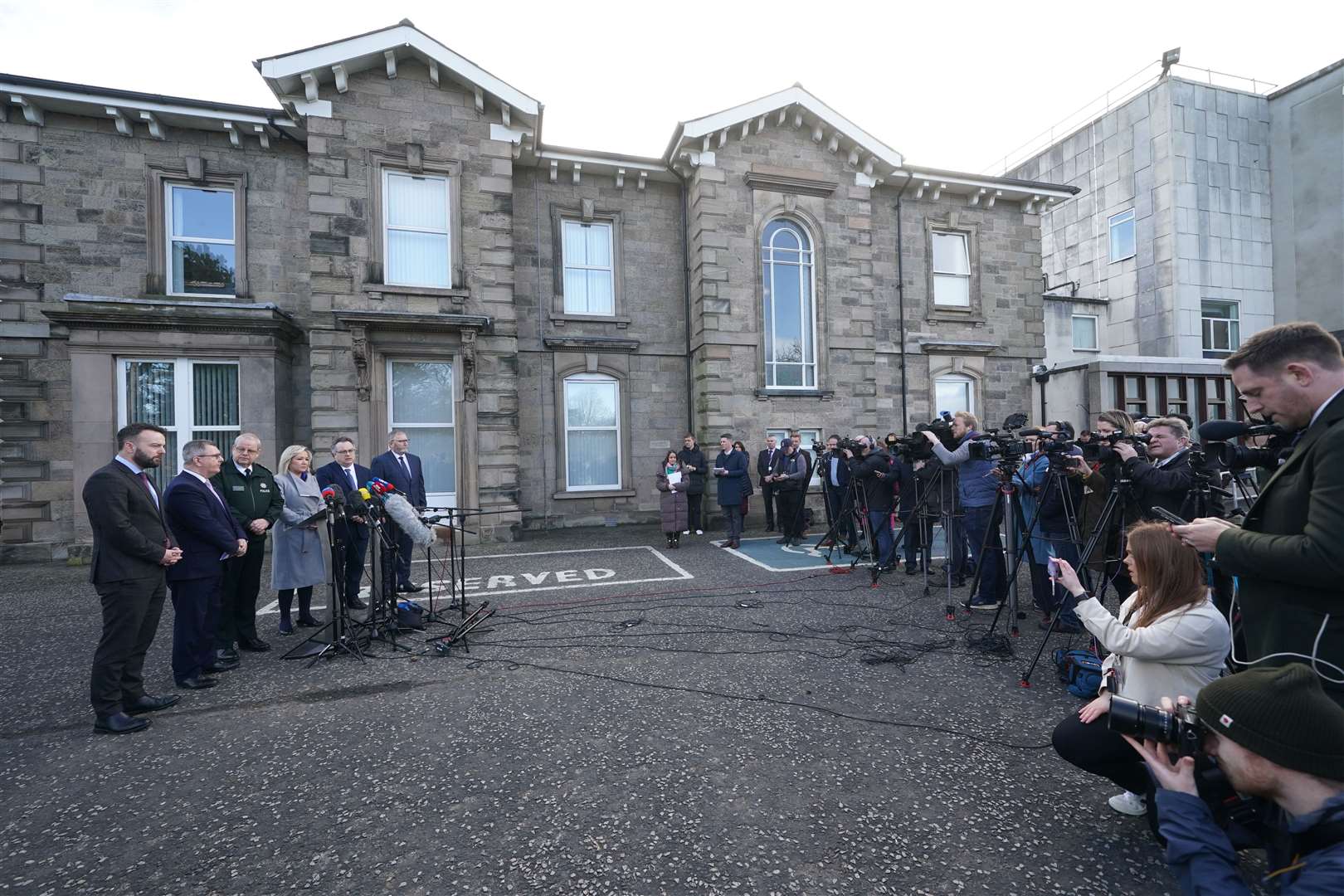 Left to right, SDLP leader Colum Eastwood, DUP leader Sir Jeffrey Donaldson, PSNI Chief Constable Simon Byrne, Sinn Fein’s Michelle O’Neill, Stephen Farry from the Alliance party, and Ulster Unionist Party leader Doug Beattie speaking to the media outside the PSNI HQ in Belfast (Brian Lawless/PA)