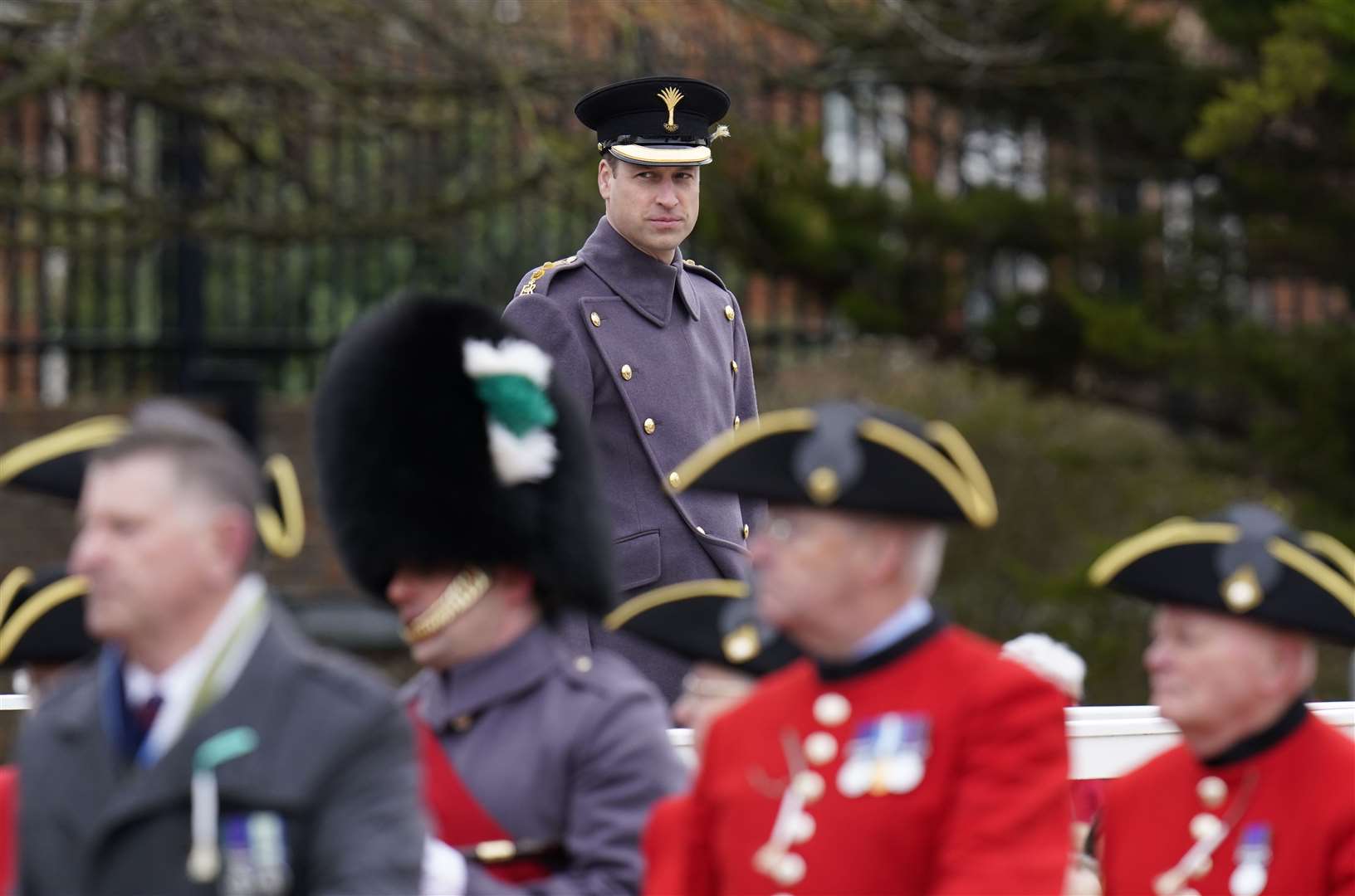 William watches a march past during the St David’s Day visit (Andrew Matthews/PA)