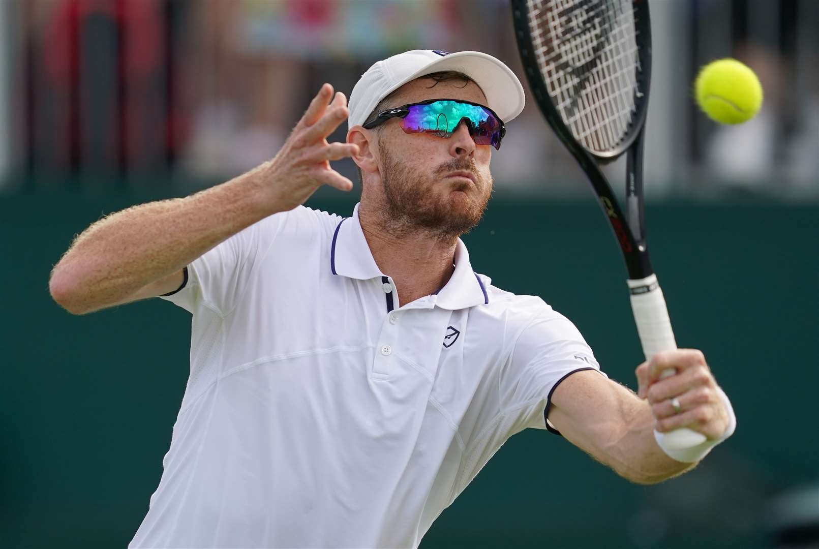 Jamie Murray in action during his mixed doubles match (Victorian Jones/PA)