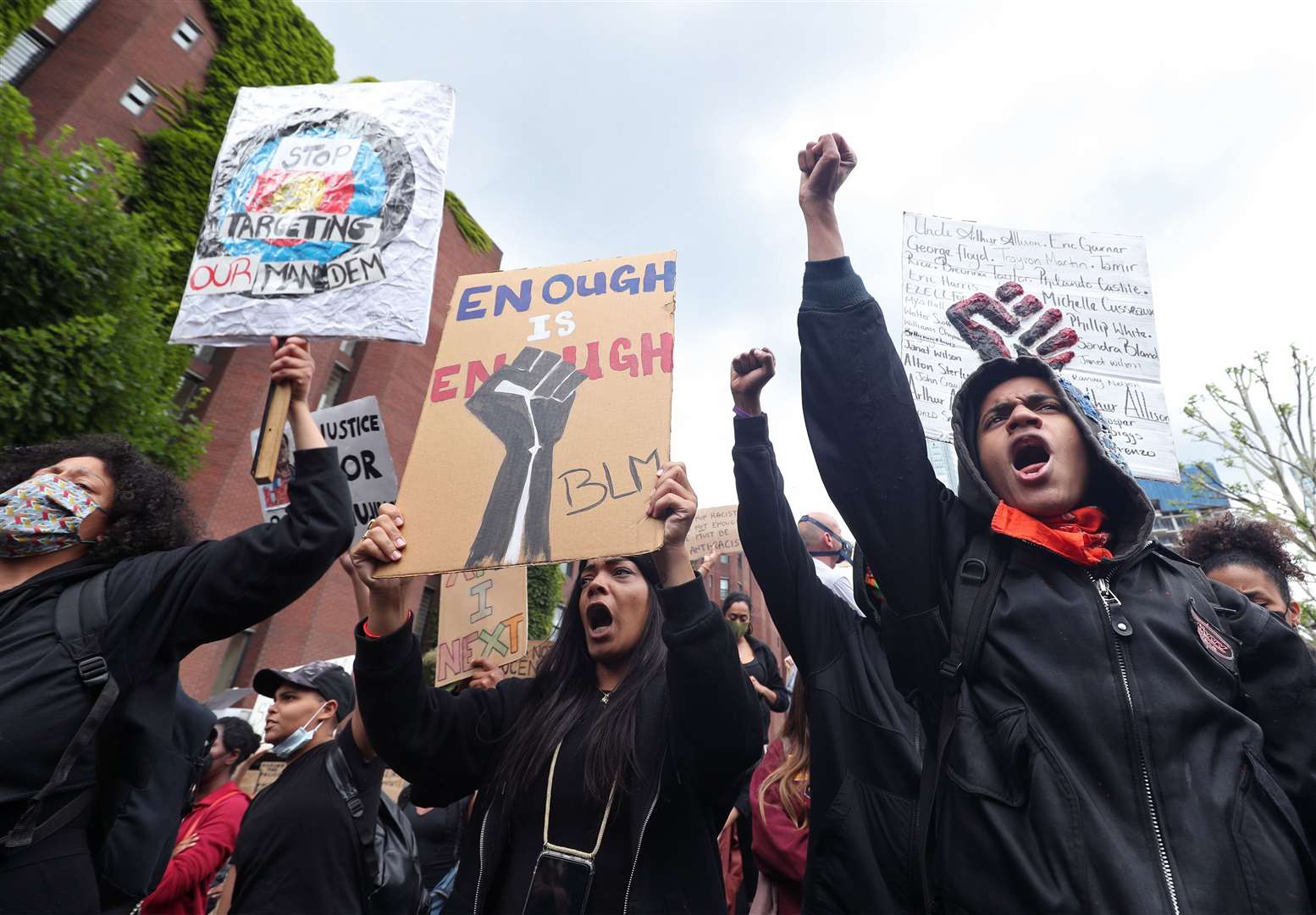 People taking part in a Black Lives Matter protest rally outside the US Embassy in London, in memory of George Floyd (Yui Mok/PA)