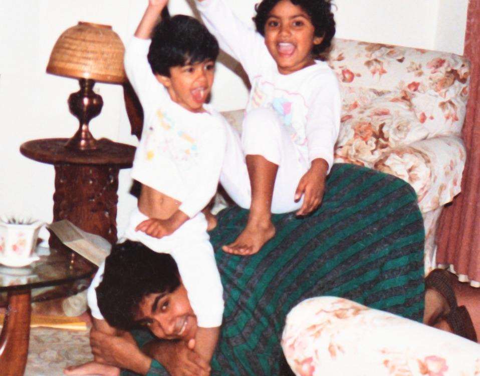 Lakshman with his sons Jonathan and James, now 32 and 30